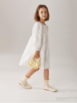 Vestido Suri infantil, vestido creme menina, vestido com pétalas, moda festa infantil, vestido elegante criança, vestido cerimônia menina, vestido confortável menina, vestido para ocasiões especiais, vestido mangas bufantes, vestido 3-8 anos