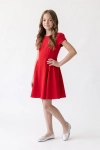 Vestido de cerimónia Rumi vermelho – vista a três quartos, corpo ajustado e saia rodada