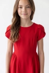 Vestido de cerimónia Rumi vermelho – parte de cima com mangas tulipa e decote redondo, vista de frente